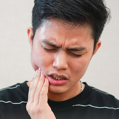 口腔癌会有什么症状？哪些原因容易引起？